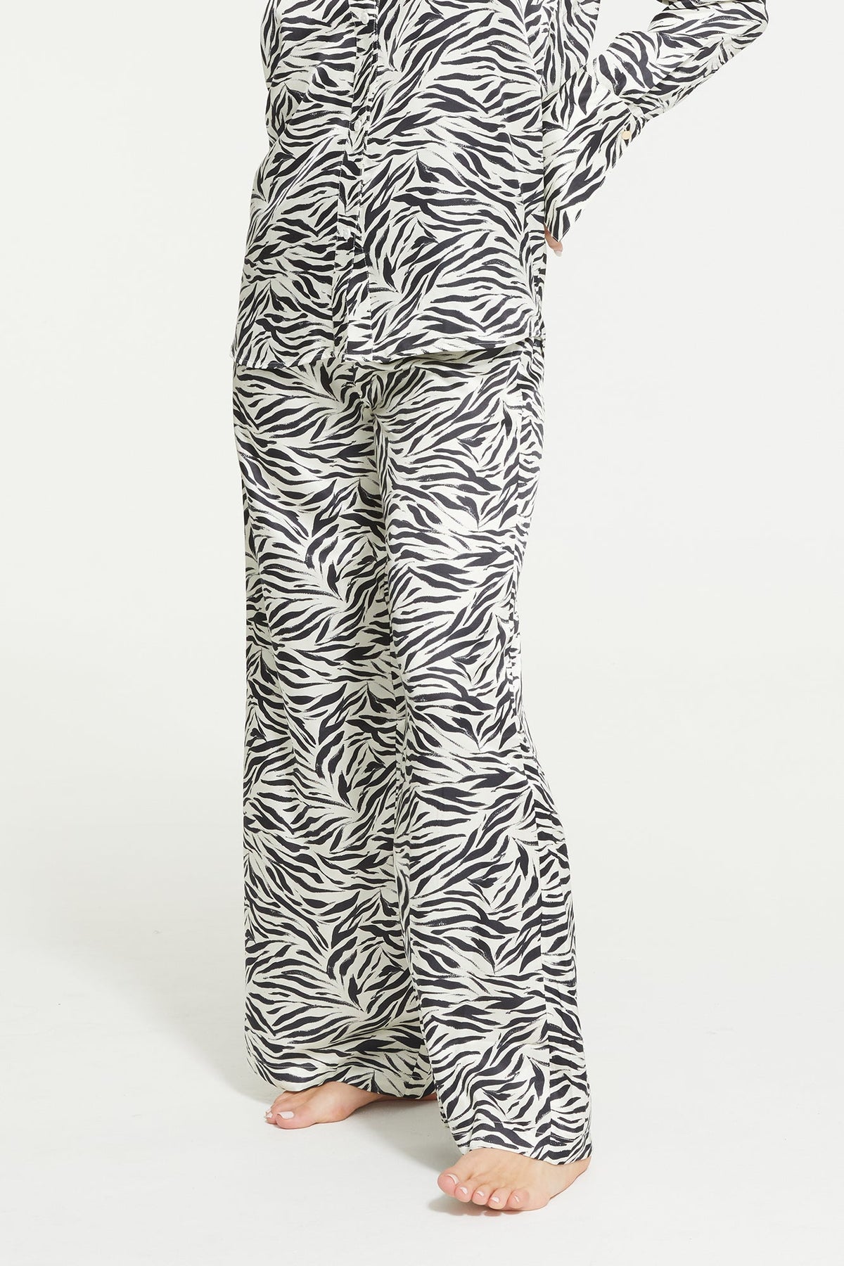 The Zafina Long Pants in Brush Zebra Print by Ginia